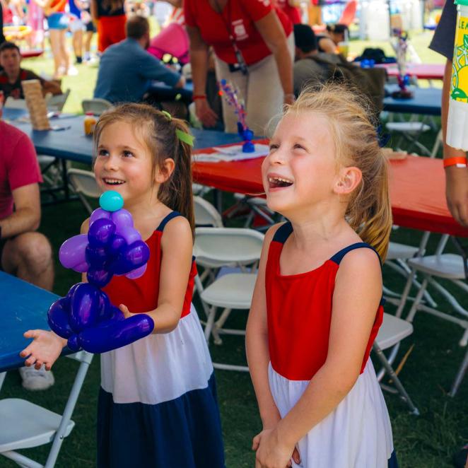Girls at Amazon Family Fun Zone on July 4th