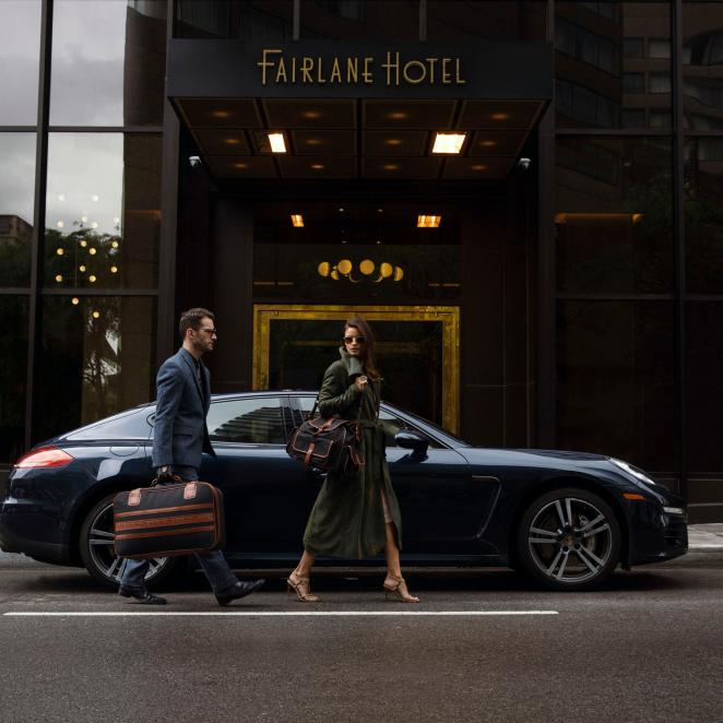 Couple arriving at the Fairlane hotel