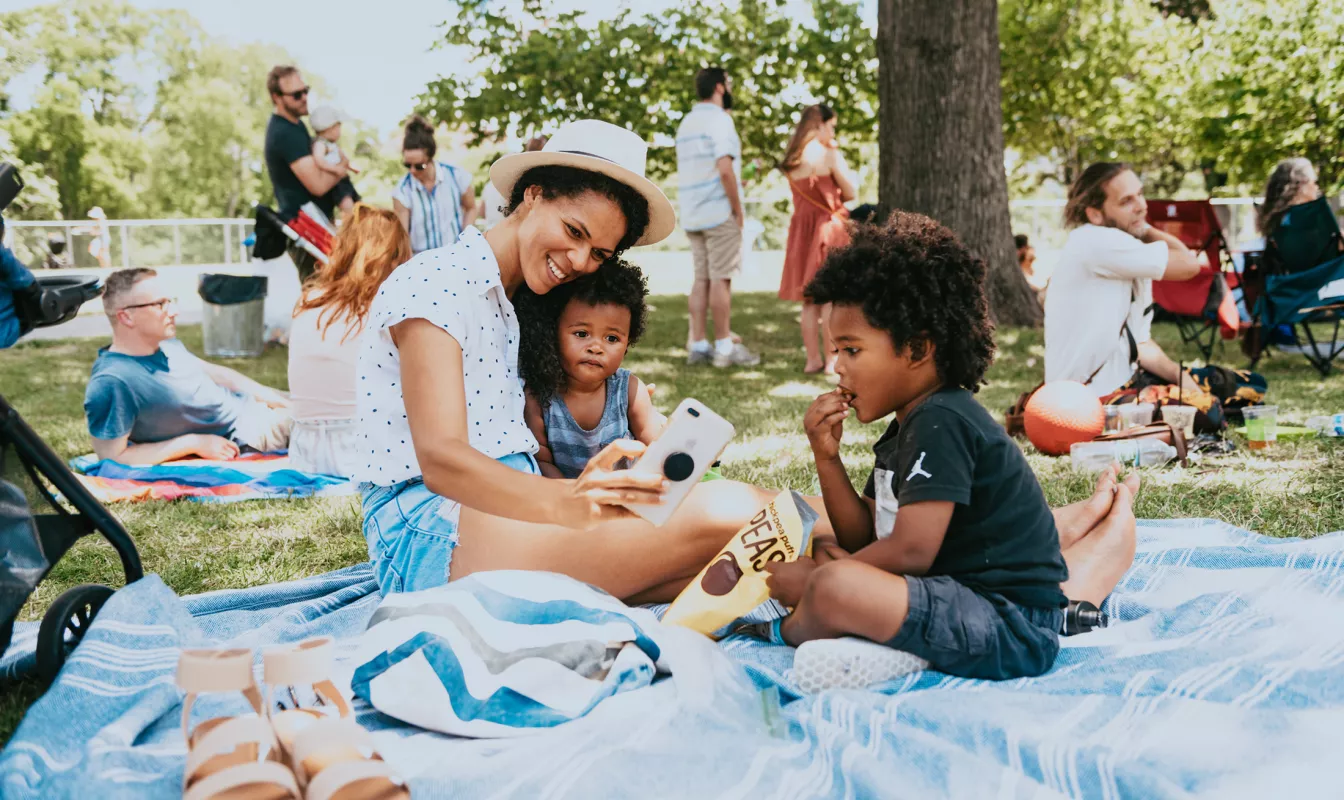Family in Centennial Park for Musicians Corner