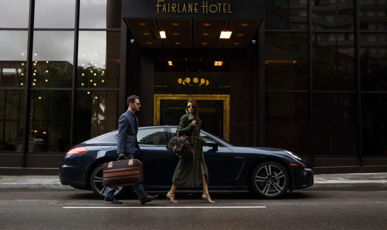 Couple arriving at the Fairlane hotel