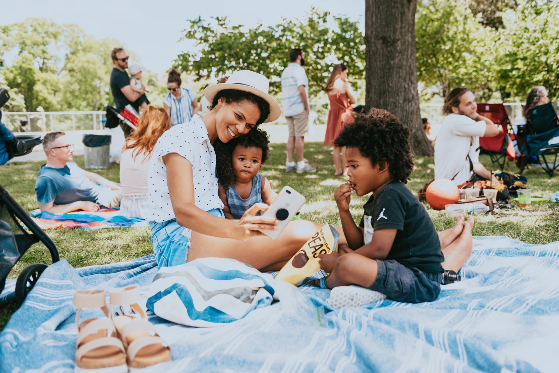 Family in Centennial Park for Musicians Corner
