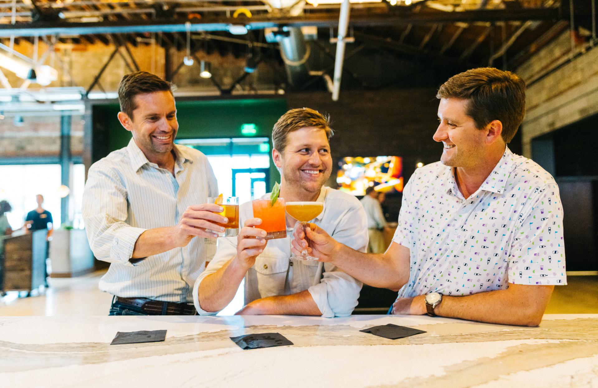 Guys with cocktails at Nelson's Green Brier Distillery