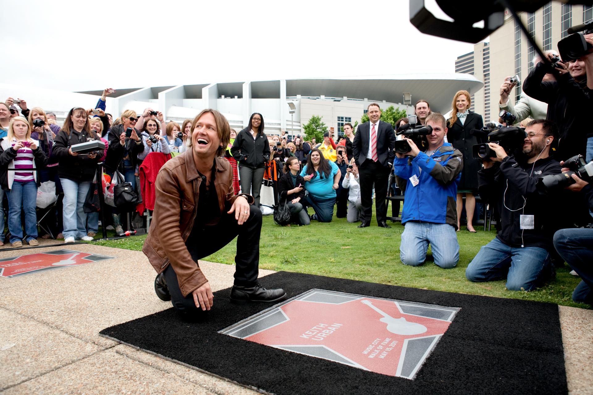 Keith Urban with his star on Music City Walk of Fame