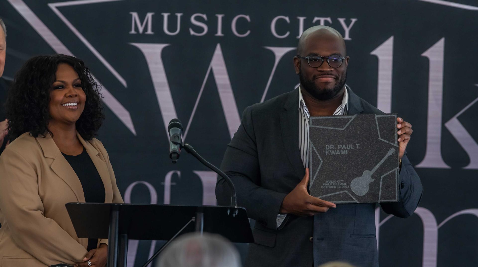 Dr. Kwami's family accept his star on the Music City Walk of Fame