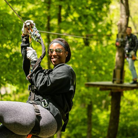 Woman on zipline at Adventure Park at Nashville