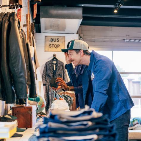Guy shopping at Imogene + Willie
