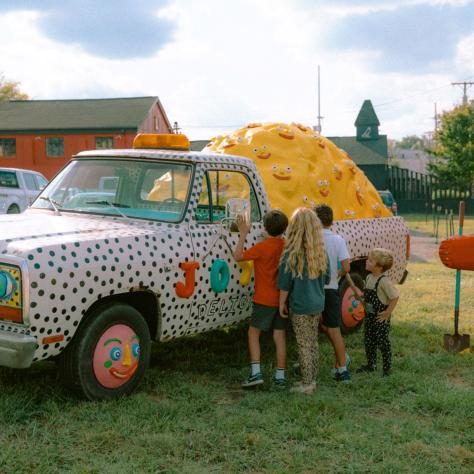 Kids with art at Artville