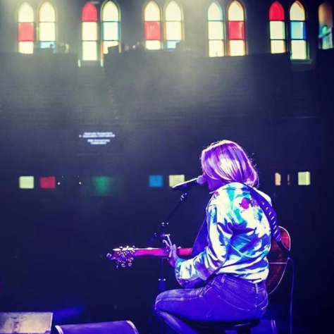 Jessi Alexander performing at The Ryman Auditorium