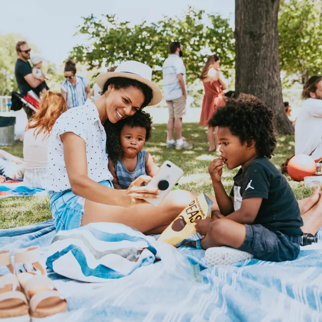 Family in Centennial Park for Musicians Corner