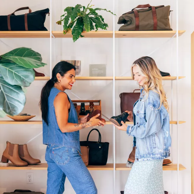 Girlfriends shopping at Nisolo