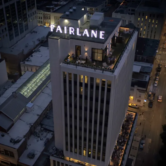 Aerial photo of the Fairlane Hotel building in the evening