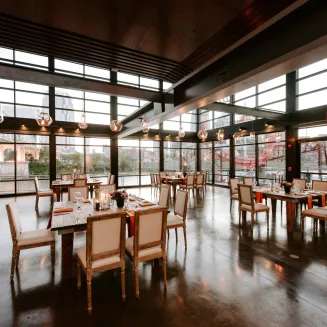 Corporate dinner setup on the Cumberland floor of the Bridge Building Event Spaces. Photo by Sara Bill Photography.