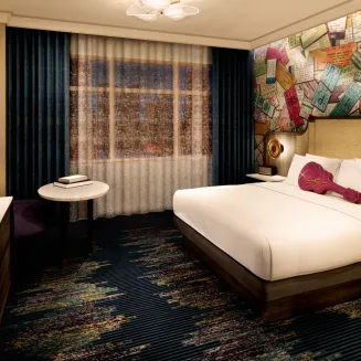 Step into one of our beautifully designed guest rooms that blend comfort, character, and a touch of southern hospitality. Enjoy breathtaking views of the city skyline and river with curated amenities including an in-room music experience and luxury linens to make every moment memorable.