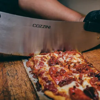 Hot and Fresh Pizza Ready to Chop