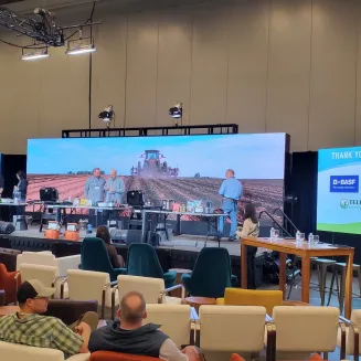 Three LED screens created the backdrop for Potato Expo's demo stage.