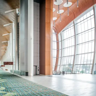view of grand lobby adjacent to main concourse leading to exhibit halls
