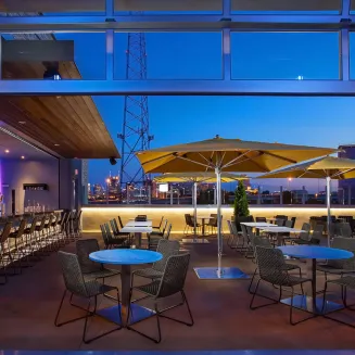 View of the sunset from the patio at Topgolf Nashville in Nashville, TN.