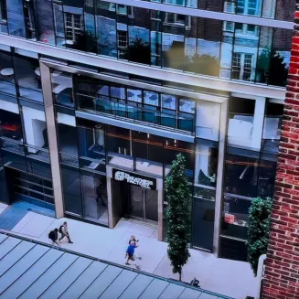 Drone footage of the front of the building.