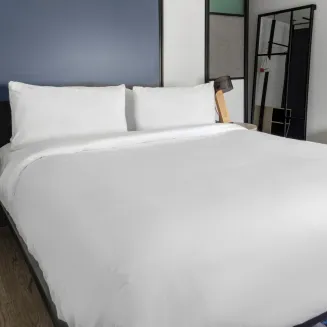 Enjoy our plush modern king bed loft style hotel rooms!
