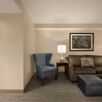 2 King Bed Parlor Suite; 2 King Beds and a living area with sleeper sofa and a wet bar.