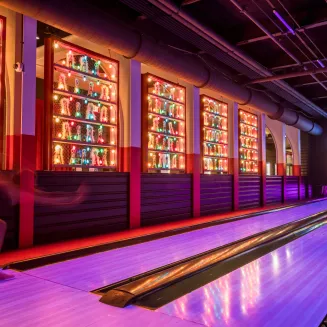 19 Premier Bowling Lanes, split between two floors overlooking the stage!