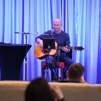 Stage shot of Cliff leading a workshop