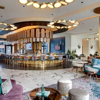 Lovelorn Lounge located on the 5th Floor of the hotel offers a sharable New American menu that shows classic southern influences and ingredients with options to offset guest requests for dinner. Strong mixology program with a focus on local beer and spirits.