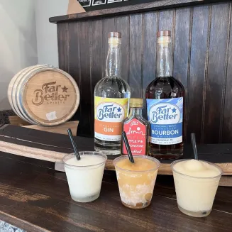 Spirits bottles and frozen drinks at Far Better Distillery