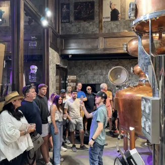 We offer the finest pub crawls in Nashville! Here’s a group getting an intimate look at the whiskey-making process before enjoying some samples.
