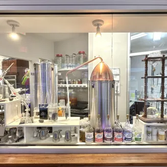 Far Better Distillery "Willy Wonka Wall" of distilling equipment