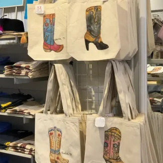 Custom totes with original watercolor boot art.