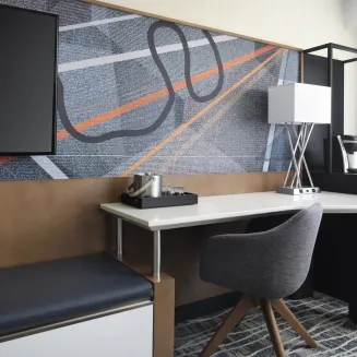 Convenient desk area, next to the coffee maker and mini-refrigerator
