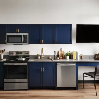 Memoir Residential studio kitchens are fully loaded with microwave, dishwasher, full size fridge, oven/stovetop, desk area, and come equipped with set of dishware, glassware, cookware, etc.