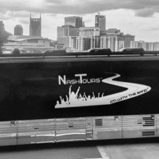 NashTours Bus in front of Nashville Skyline