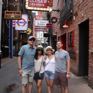 Great photo of guests and the alley on walking tour!
