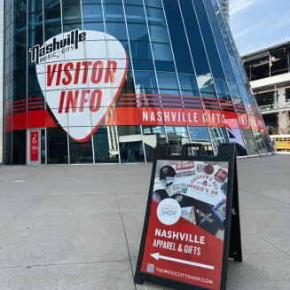 Nashville Visitor Information Center exterior with gift shop signage and display board