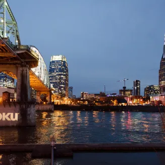 Corporate logo gobo shining on the Pedestrian Bridge in downtown Nashville at the Bridge Building Event Spaces.