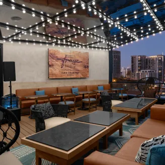 Covered outdoor rooftop lounge
