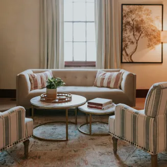 West Suite lounge area with flat screen TV for power point and presentations.