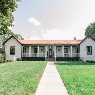 Large Garden and Historic front porch greet your guests.