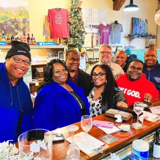 Guests enjoying a wine tasting at Grinder's Switch Winery!