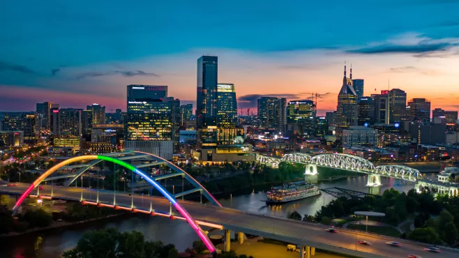 Nashville Skyline Gateway Bridge lit up as a rainbow
