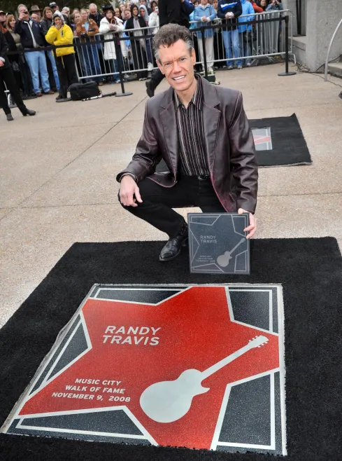 Randy Travis with his star on the Music City Walk of Fame