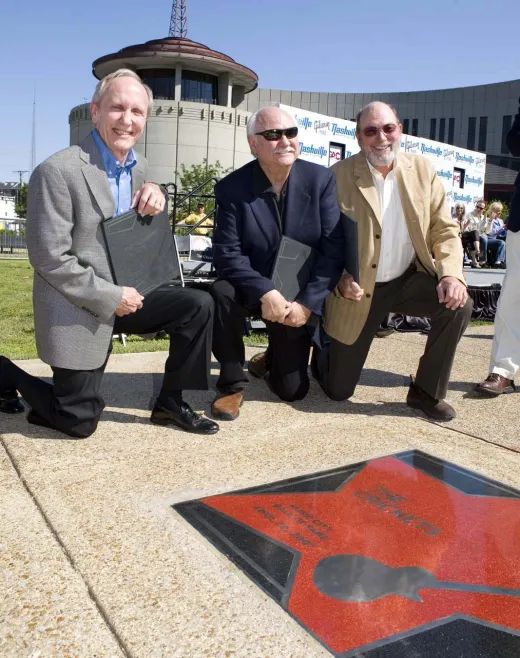 The Crickets with their star on the Music City Walk of Fame.