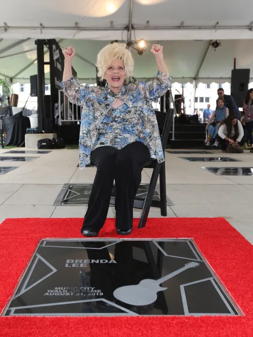 Brenda Lee with her star on the Music City Walk of Fame