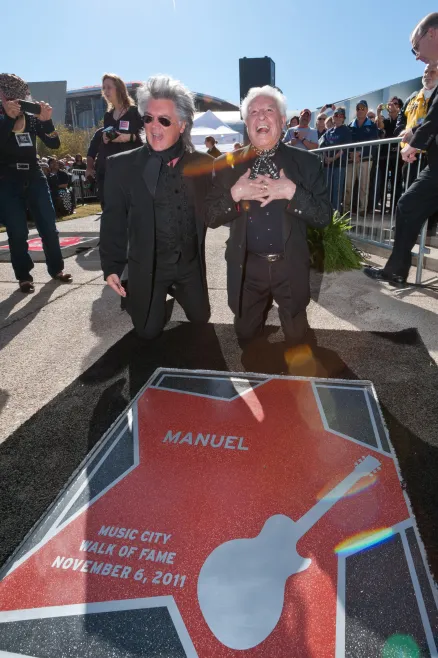 Marty Stuart and Manuel with his star on the Music City Walk of Fame.
