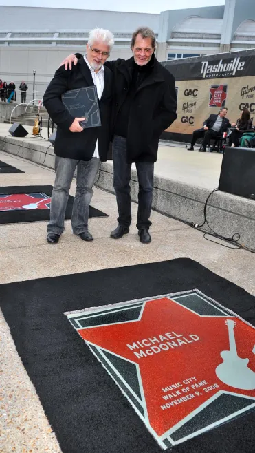 Michael McDonald with his star at the Music City Walk of Fame