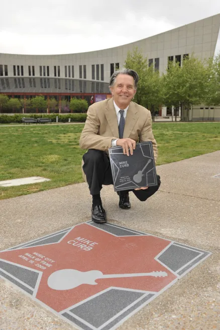 Mike Curb with his star on the Music City Walk of Fame. 