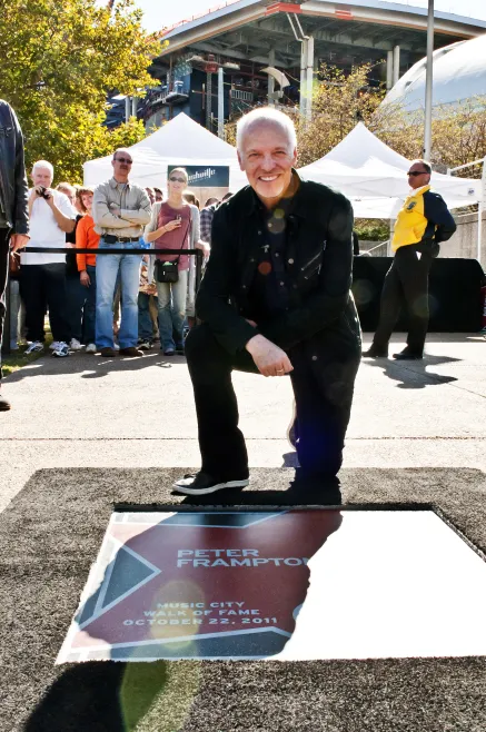 Peter Frampton with his star on the Music City Walk of Fame