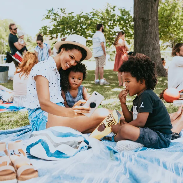 Family in Centennial Park for Musicians Corner